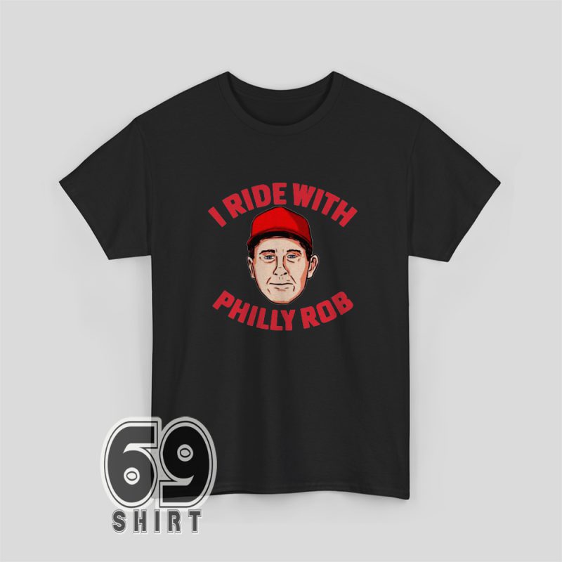 Black unisex T-shirt with bold red "I Ride With Philly Rob" text, honoring Phillies manager Rob Thomson.