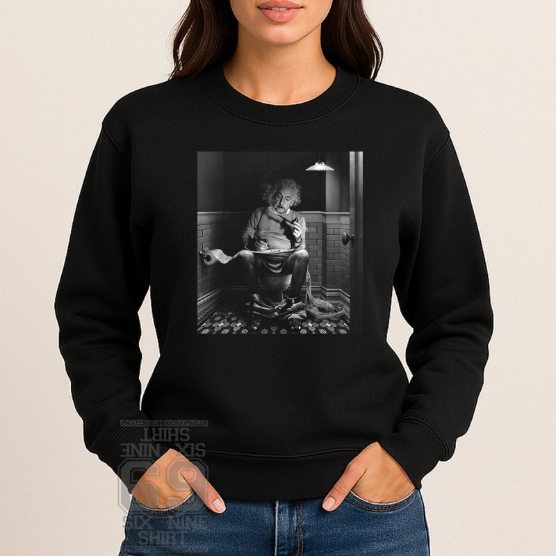 black sweatshirt wiht Black and white image of Albert Einstein sitting on a toilet, smoking a pipe, and writing equations on toilet paper
