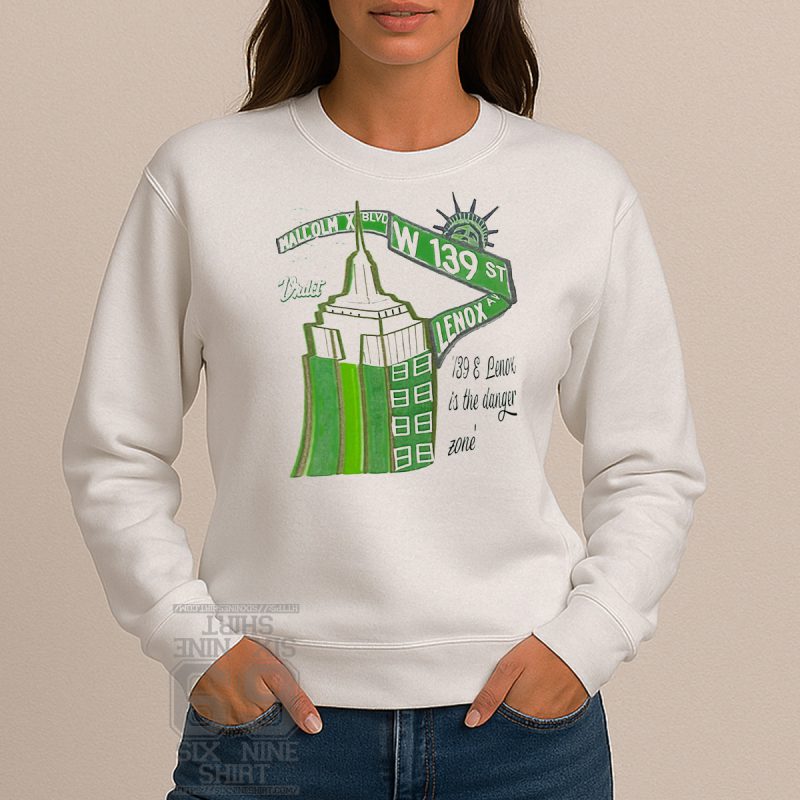 Sweatshirt design featuring street signs for Malcolm X Blvd, W 139th St, and Lenox Ave with NYC urban theme and graffiti style