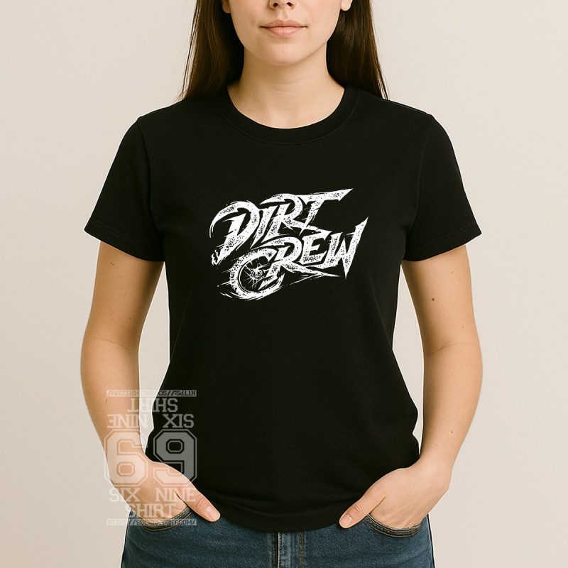 women black shirt with Bold white distressed lettering that reads "Dirt Crew" with a subtle bike wheel illustration integrated into the letter C on a black background.