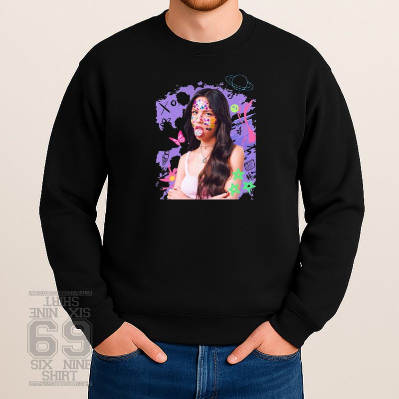 Olivia Rodrigo inspired sweatshirt with bold “Good 4 U” text and pop-punk design elements, including broken hearts and flames, on a black or pastel crewneck.