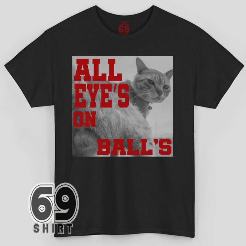 Funny T-shirt with a cat giving a side-eye and bold red text reading ‘All Eye’s On Ball’s’ in meme style