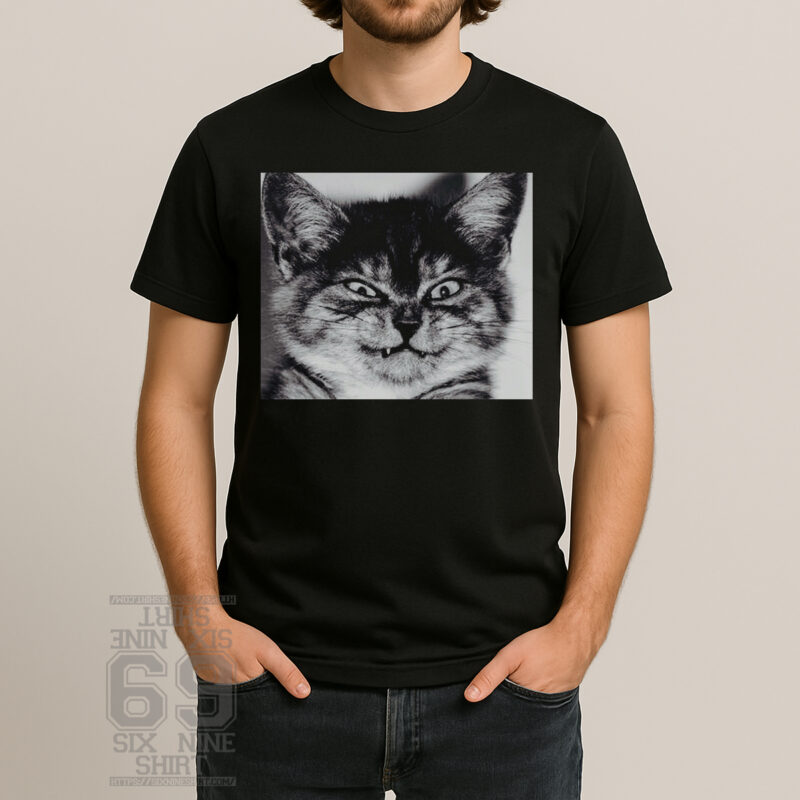 Unhinged grumpy cat face with vampire fangs black and white graphic t-shirt design sixnineshirt.com